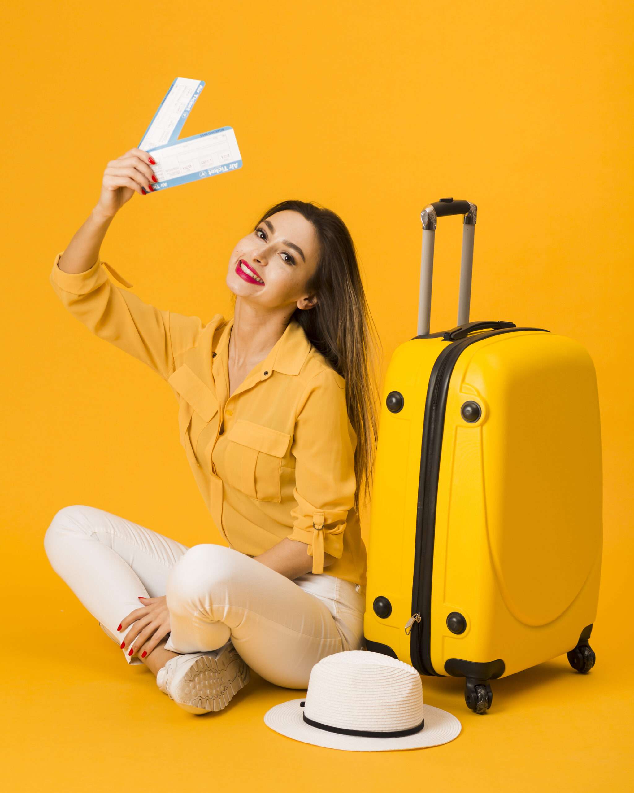 VSMR Visas smiley-woman-posing-luggage-while-holding-plane-tickets