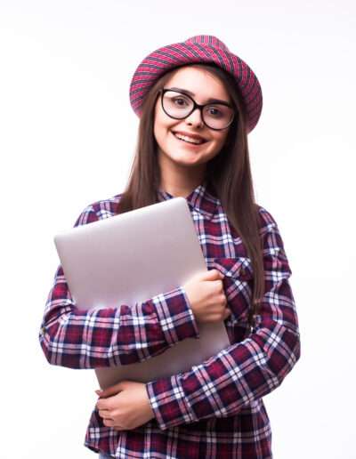 Young smiling confident woman using laptop computer